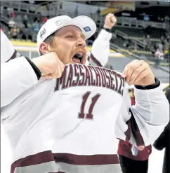  ?? GETTY IMAGES ?? UMass forward Carson Gicewicz celebrates after the Minutemen topped St. Cloud State for the National Championsh­ip on Saturday