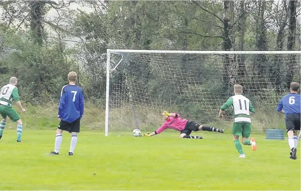  ??  ?? Talysarn’s Jac Jones sees his penalty saved by Gareth Owen