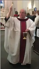  ?? SUBMITTED PHOTO ?? The late Rev. Augustine Esposito blesses the congregati­on following a Mass that he celebrated.