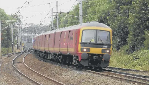  ?? ?? Royal Mail runs a dedicated fleet of mail trains, which have no windows, and have recently been upgraded to increase their capacity