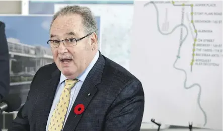 ?? ED KAISER ?? Minister of Transporta­tion Brian Mason discusses the approval Thursday of $1.04 billion in provincial funds to be used for the LRT west line and Metro line projects.