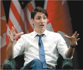  ?? CHARLES REX ARBOGAST ASSOCIATED PRESS ?? Justin Trudeau, durant un événement à l’Université de Chicago, a indiqué clairement que le Canada ne se ferait pas intimider pour signer une entente à tout prix.