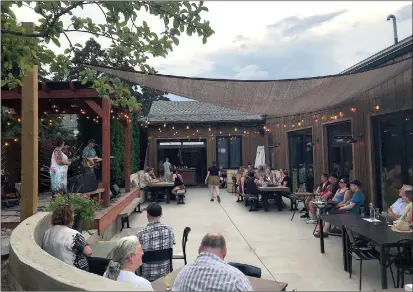  ?? YVONNE TURGEON/Special to Okanagan Newspaper Group ?? Cod Gone Wild played to a sold-out crowd at the new orchard-side patio at BX Press Cidery.