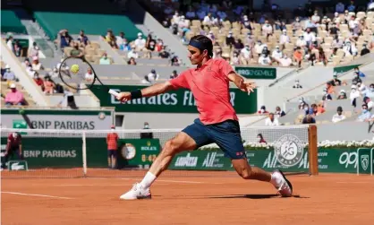  ??  ?? Roger Federer makes a backhand return. Photograph: Quality Sport Images/Getty Images