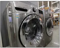  ?? (AP/Steven Senne) ?? Factory orders for durable goods like this washer and dryer rose in December, the Commerce Department said Tuesday.