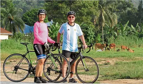  ??  ?? Avid cyclists: Salas and Cernusco enjoying nature during their cycling trips.