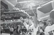  ?? Kent Nishimura Los Angeles Times ?? TAYLOR WARD gets a sports drink shower after hitting a game-winning home run for the Angels.