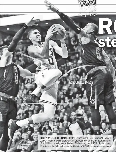  ?? (AP PHOTO/CHARLES KRUPA) ?? BEST PLAYER OF THE GAME. Boston Celtics guard Terry Rozier (12) shoots over Cleveland Cavaliers forward Jae Crowder (99) during the fourth quarter of an NBA basketball game in Boston, Wednesday, Jan. 3, 2018. Rozier scored 20 points as the Celtics defeated the Cavaliers 102-88.