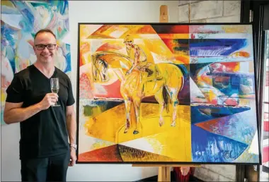  ?? PHOTOS PROVIDED ?? Former trainer and current abstract artist Seth Benzel is shown in front of one of his recent works.