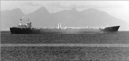  ??  ?? AT ANCHOR: Top: Tanker photograph­ed off Kalk Bay during the Suez Canal closure in 1971. Several ships entered the bay to undertake machinery repairs.