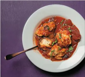  ?? GORAN KOSANOVIC THE WASHINGTON POST ?? Tomato stew with basil dumplings.