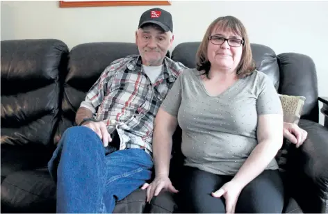  ?? LAURA BARTON/ WELLAND TRIBUNE ?? Wayne and Jackie Muise say they’re grateful for their carbon monoxide alarm, which alerted them to levels of the gas in their home on Jan. 28. They now tell others to make sure their alarms are working, too.