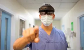  ?? Photograph: Alicia Canter/The Guardian ?? Surgeon James Kinross wears a HoloLens at St Mary’s hospital in Paddington, west London.