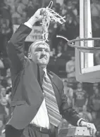  ?? COLUMBUS DISPATCH FILE PHOTO ?? Coach Thad Matta had the honor of making the last cut of the net after Ohio State captured the outright Big Ten title on March 5, 2006.