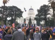  ?? Adam Beam / Associated Press ?? Hundreds of proTrump demonstrat­ors gather outside the California Capitol on Jan. 6.