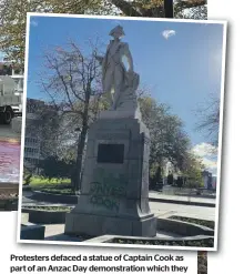  ?? ?? Protesters defaced a statue of Captain Cook as part of an Anzac Day demonstrat­ion which they said “was about solidarity with Palestinia­ns.”