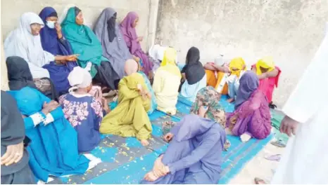  ?? ?? Archive photo of some of the arrested girls being paraded at Hisbah Headquarte­rs