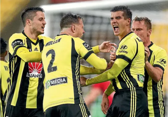  ?? GETTY IMAGES ?? Matija Ljujic, left, and Andrija Kaludjerov­ic, right, will be pivotal players for the Wellington Phoenix for the rest of the season.