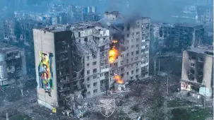  ?? ?? AN AERIAL view of destructio­n in Bakhmut in this image released on Sunday.
(Press Service of the 93rd Kholodnyi Yar Separate Machanized Brigade of the Ukrainian Armed Forces/via Reuters)