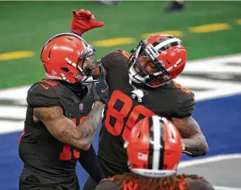  ?? Michael Ainsworth / Associated Press ?? Cleveland Browns receiver Odell Beckham Jr., left, feasted on the Cowboys last week to the tune of 154 total yards and three touchdowns —two through the air and one on the ground.