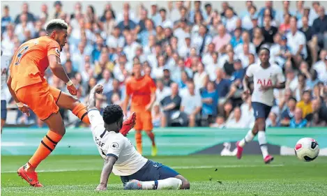  ?? Picture: Getty Images. ?? Joelinton fires in Newcastle’s winner at Tottenham.