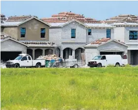  ?? JIM RASSOL/STAFF PHOTOGRAPH­ER ?? Constructi­on continues at the Gulfstream Preserve by Lennar Homes west of LakeWorth. The 248 homes being built are priced from $380,990 to $494,990.