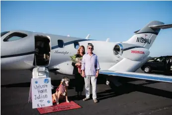  ??  ?? TOP: The MacQueens after their world tour, welcomed by local Pensacola celebrity, Sadie the Aviation Dog