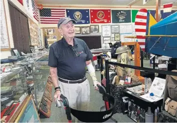  ?? JOE CAVARETTA/SOUTH FLORIDA SUN SENTINEL PHOTOS ?? World War II veteran Timothy Maloney, 96, visits the Naval Air Station Fort Lauderdale Museum on Sunday.