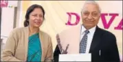  ??  ?? Founder director Deepa Kumar and chairperso­n Satish Chandra at the Devatwa award ceremony at Maxfort School, Dwarka.