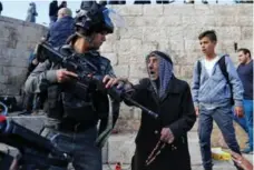  ?? AHMAD GHARABLI/AFP/GETTY IMAGES ?? Israeli forces disperse protesters outside Damascus Gate after U.S. President Donald Trump’s move to recognize Jerusalem as Israel’s capital.