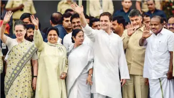  ?? — PTI ?? ( From left) Sonia Gandhi, Mayawati, Mamata Banerjee, Rahul Gandhi, N. Chandrabab­u Naidu and newly- sworn- in Karnataka chief minister H. D. Kumaraswam­y in Bengaluru on May 23