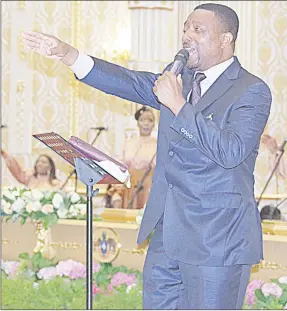  ?? ?? Hosana Outreach Ministries Apostle Madudu Mabuza preaching at the Year-End Thanksgivi­ng Prayer Service yesterday.