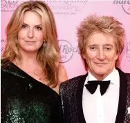  ??  ?? Model: Ms Lancaster in her heyday in 1993. Left: With Rod Stewart