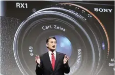  ??  ?? TOKYO: Sony President and CEO Kazuo Hirai speaks during a press conference at the Sony Corp headquarte­rs in Tokyo yesterday. Hirai said the company’s board will discuss a proposal by US hedge fund manager Daniel Loeb to spin off up to 20 percent of its...