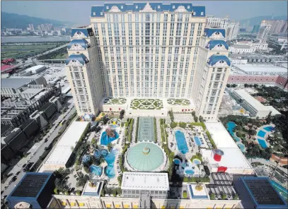  ?? Erik Verduzco ?? Las Vegas Review-journal Follow @Erik_verduzco The Parisian Macao hotel-casino. Its owner, Las Vegas Sands, gets more than 50 percent of its revenue from Macau.