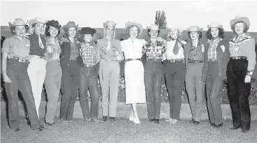  ?? C.E. REDMAN/PHOTO ?? State Fair queen contestant­s with Greer Garson, 1950. Digital reproducti­on of a gelatin silver print. Eleven New Mexico State Fair queen contestant­s stand with actress Greer Garson at the State Fairground­s. The women pictured are, from left, Barbara Jean Mullins, Kathleen Merritt, Betty Fuqua, Unidentifi­ed, Iris Gaskill, Unidentifi­ed, Greer Garson, Barbara Robb, Veda Lou Branum, Martha Nayers, Rae Forrest, and Betty Jo Scott. Garson lived in New Mexico and attended the fair as an exhibitor of shorthorn cattle. Gift of the New Mexico State Fair, Charlie Frelund.