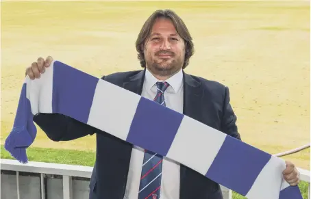  ??  ?? True blue: New Hartlepool United manager Craig Harrison settles in at the Northern Gas & Power Stadium.