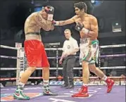  ?? GETTY IMAGES ?? Vijender Singh (right) has won all his seven pro bouts but Tanzanian Francis Cheka will be a major test.