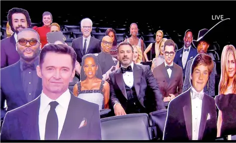  ?? — AFP photo ?? Kimmel sitting among celebritie­s cardboard cutouts during the 72nd Primetime Emmy Awards ceremony held virtually from the Staples Centre in Los Angeles.