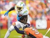  ?? Jack Dempsey Associated Press ?? CHARGERS receiver Mike Williams was not able to walk without assistance following his injury Sunday.