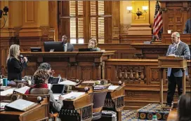  ?? BOB ANDRES / BANDRES@AJC.COM ?? State Sen. Jennifer Jordan, D-Atlanta, (left) questions state Sen. Bruce Thompson, R-White, about the computer crime bill he sponsored Feb. 12. The bill was introduced, in part, as a result of the state’s failure to protect voter records.