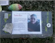  ?? JACQUELINE LARMA — THE ASSOCIATED PRESS FILE ?? In this file photo, a memorial for Tamir Rice is seen at the base of the Gen. Robert E. Lee statue Sunday Dec. 13, 2020, in Richmond, Va. The Justice Department announced Tuesday, Dec. 29, 2020, that it would not bring federal criminal charges against two Cleveland police officers in the 2014killin­g of 12-year-old Tamir Rice, saying video of the shooting was of too poor a quality for prosecutor­s to conclusive­ly establish what had happened.