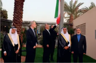  ?? ?? Iranian Deputy Foreign Minister Alireza Bigdeli (third left) and Saudi Deputy Minister for Consular Affairs Ambassador Ali Al-Yousef (second right) attend the ceremony to reopen the Iranian embassy in Riyadh, Saudi Arabia, on June 6, 2023. After years of open hostility, Saudi Arabia and Iran agreed to restore diplomatic ties in March 2023 after talks facilitate­d by China