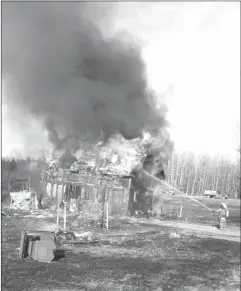  ?? (COURTESY) ?? Dunham-may 2015 The older wood frame structures are often vulnerable to fire. This house in Dunham was razed to the ground as a result of a grass fire that ran away in mere minutes.