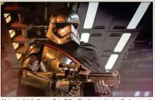  ??  ?? A la izquierda John Boyega, Daisy Ridley, Chewbacca y Harrison Ford posan en la Millenium Falcon para la revista Vanity Fair. Sobre estas líneas, la capitana Phasma, interpreta­da por Gwendoline Christie, la primera villana de la saga