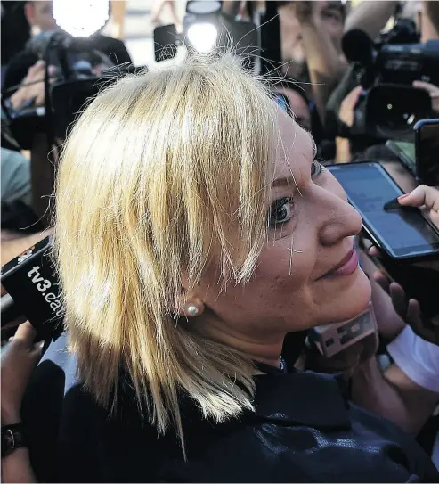  ?? OSCAR DEL POZO / AFP / GETTY IMAGES ?? Inés Madrigal arrives at court in Madrid on Tuesday to appear in a landmark trial involving thousands of suspected cases of babies stolen from their mothers and given away during the Francisco Franco era.