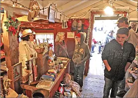  ?? Appeal-Democrat file photos ?? Donna Hankins of Forbestown welcomes guests into the Mercantile Shop in the Yuba Feather Museum’s historic replica Gold Trader Flat in 2015.