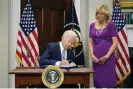  ?? ?? Joe Biden signs the Bipartisan Safer Communitie­s Act, a gun safety bill, on 25 June. Photograph: Pablo Martínez Monsiváis/AP