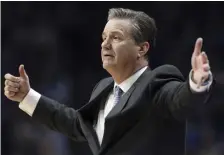  ?? ASSOCIATED PRESS ?? TOUGH NIGHT: John Calipari’s Kentucky Wildcats had won 10 in a row before being knocked off at the buzzer by No. 19 LSU, 73-71, last night in Lexington. Ky.