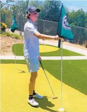  ?? RIVERA FAMILY ?? Priest James Rivera, 16, on the new putting green he designed at UCSD Health’s Bannister Family House.